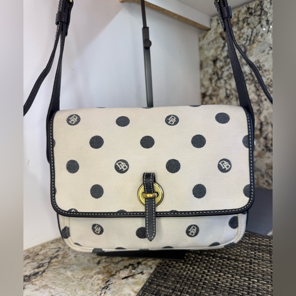 Dooney & Bourke Handbags - EUC Vintage Dooney & Bourke
Monogram Polka Dot Made in
USA Polka Dot Crossbody